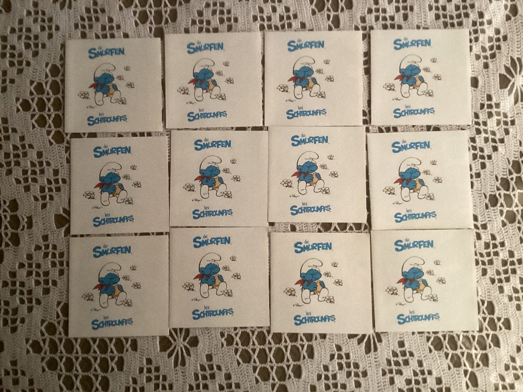 12 stickers smurfen brood zitten nog in verpakking, Ophalen of Verzenden, Gebruikt
