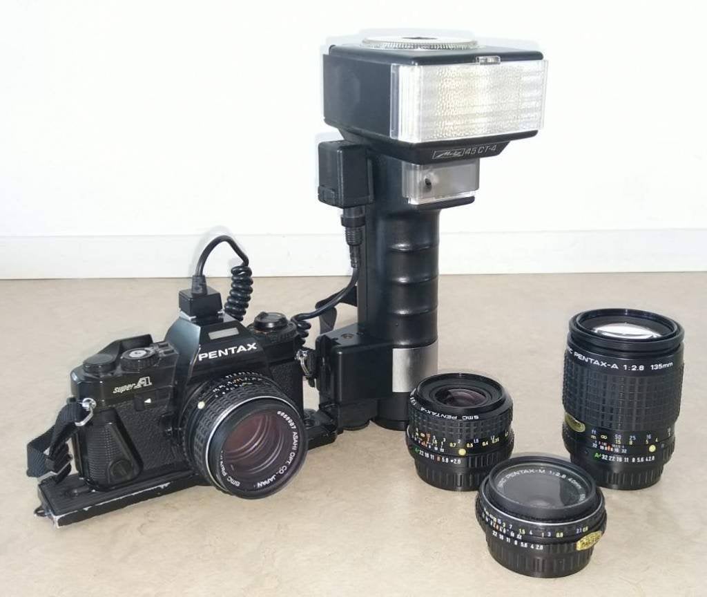 Pentax Super A spiegelreflexcamera met 3 lenzen en flitser, Audio, Tv en Foto, Fotocamera's Analoog, Ophalen, Gebruikt, Spiegelreflex