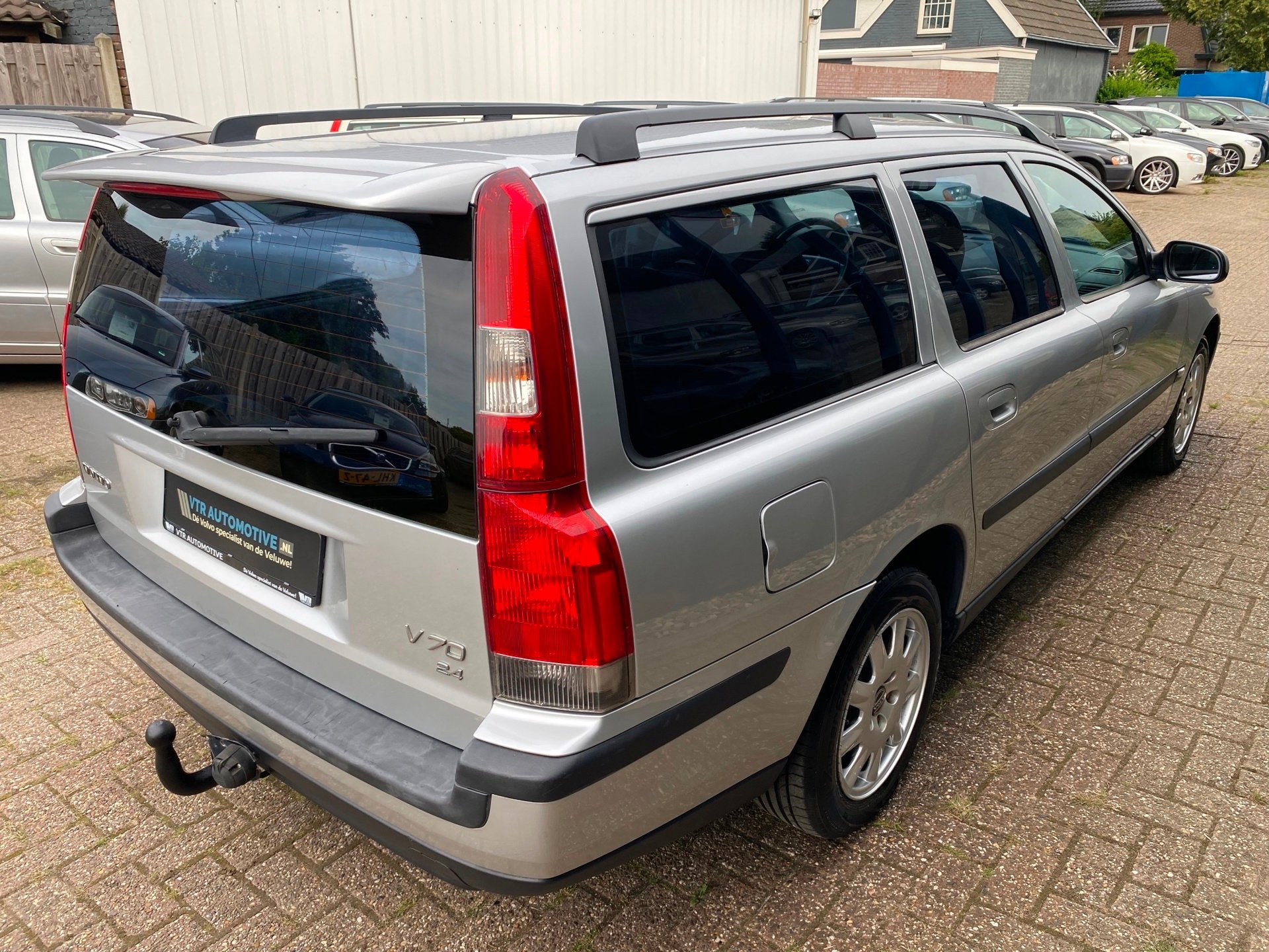Volvo V70 2.4 Comfort Line 170PK Automaat, Auto's, Volvo, Gebruikt, Zwart, Leder en Stof, Stoelverwarming