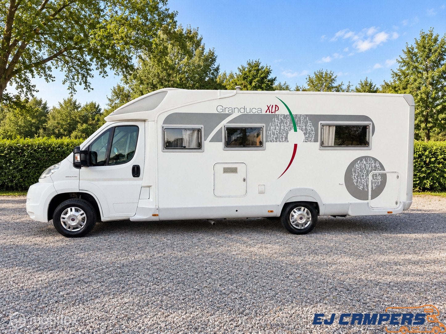 Trigano GRANDUCA XL P / Queensbed!, Caravans en Kamperen, Overige merken, 7 tot 8 meter, Bedrijf, Half-integraal