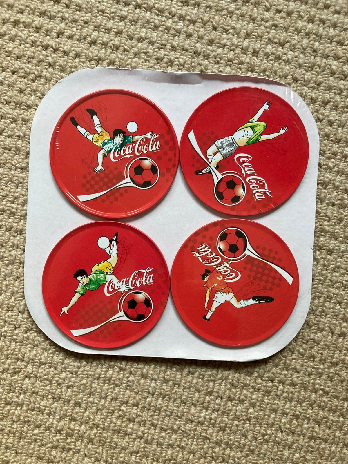 voetbal coca cola onderzetters, Ophalen of Verzenden, Zo goed als nieuw, Overige materialen