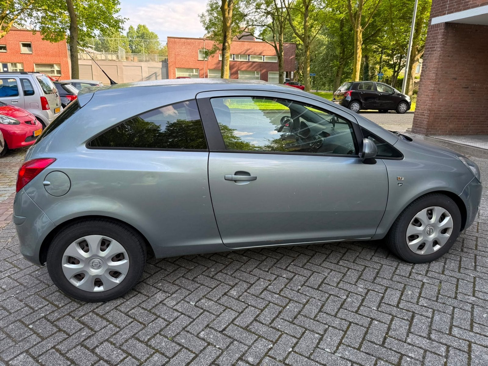 Opel Corsa 1.2 16V 3D Easytronic 2010 Grijs, Auto's, Opel, 450 kg, 40 €/maand, 750 kg, 1229 cc