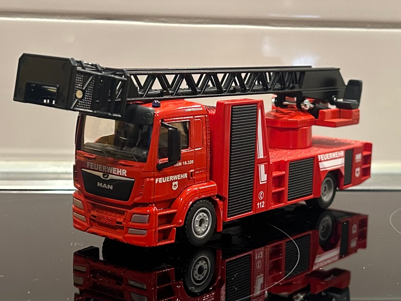 Siku MAN TGS Brandweer Ladderwagen 1:55, Verzenden, Zo goed als nieuw, Bus of Vrachtwagen