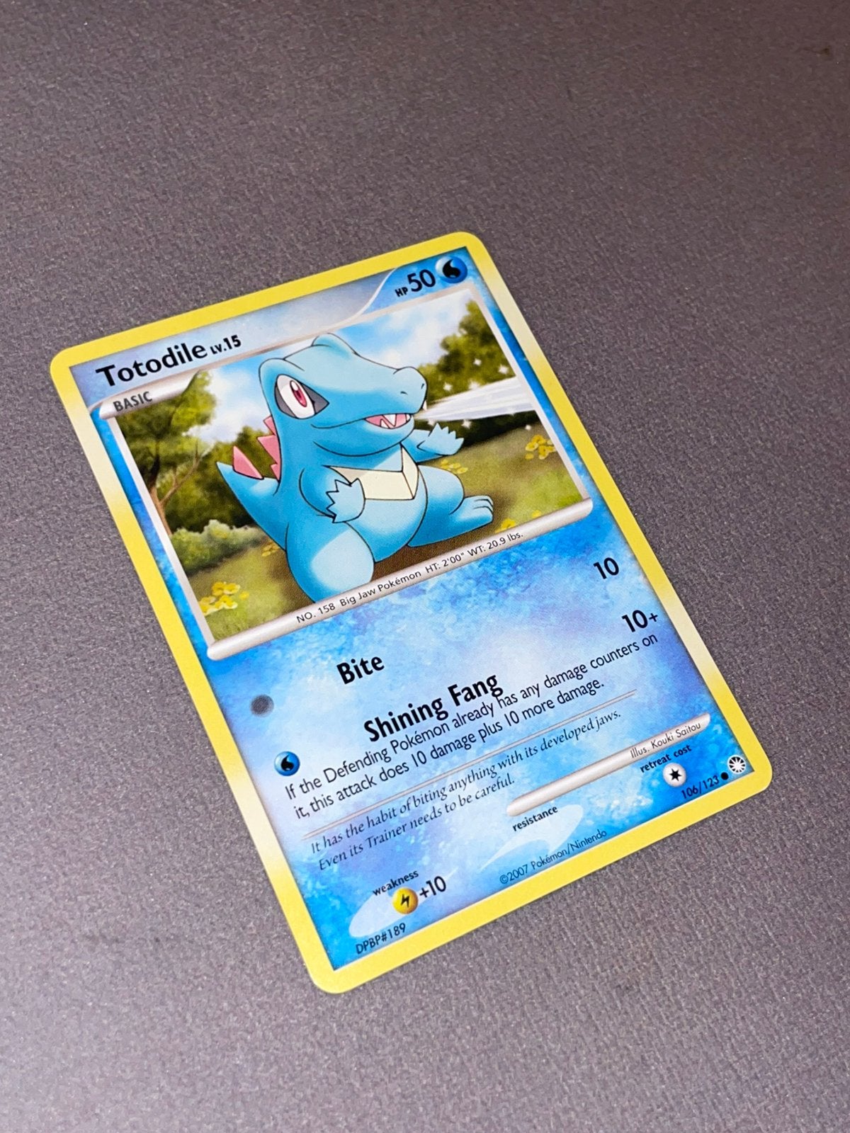 Pokemon - Totodile lv.15 106/123, Hobby en Vrije tijd, Ophalen of Verzenden, Zo goed als nieuw, Losse kaart