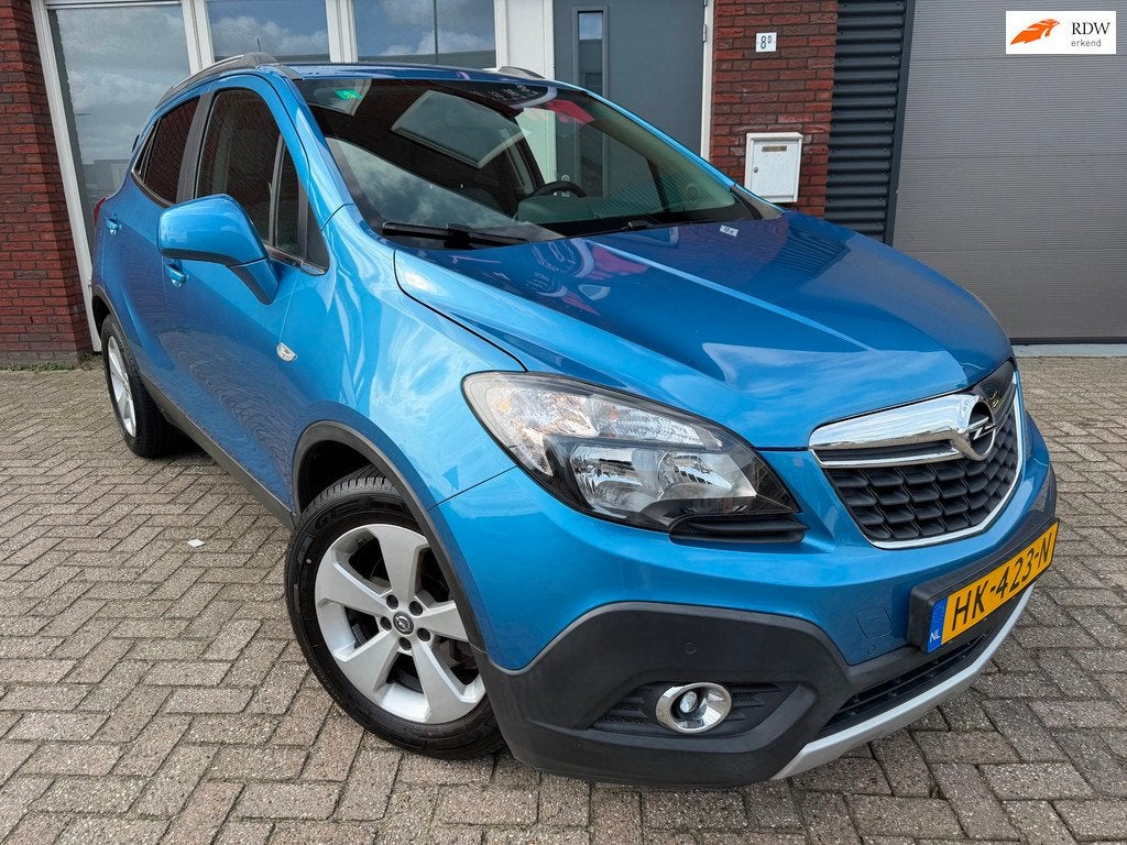 Opel Mokka 1.4 T Cosmo / Camera / Leder / Navi / PDC / NAP, Auto's, Opel, Voorwielaandrijving, Gebruikt, 4 cilinders, Met garantie (alle)