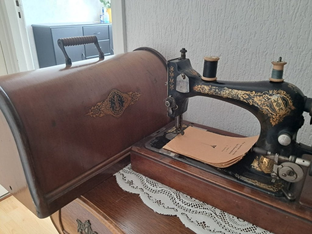 vintage singer naaimachine, Ophalen