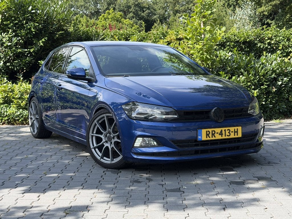 Volkswagen Polo 1.0 TSI 140pk AUTOMAAT KERAMISCHE COATING, Auto's, Startonderbreker, Stof, Blauw, 49 €/maand