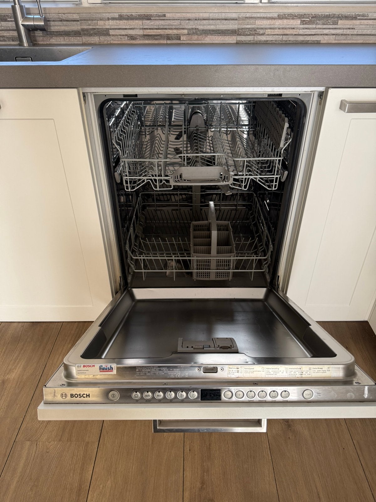 Foto 14 van Moderne witte keuken met Bosch apparatuur