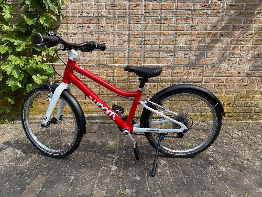 Woom 4 met spatborden en standaard, Ophalen, 20 inch of meer, Gebruikt, Velgrem