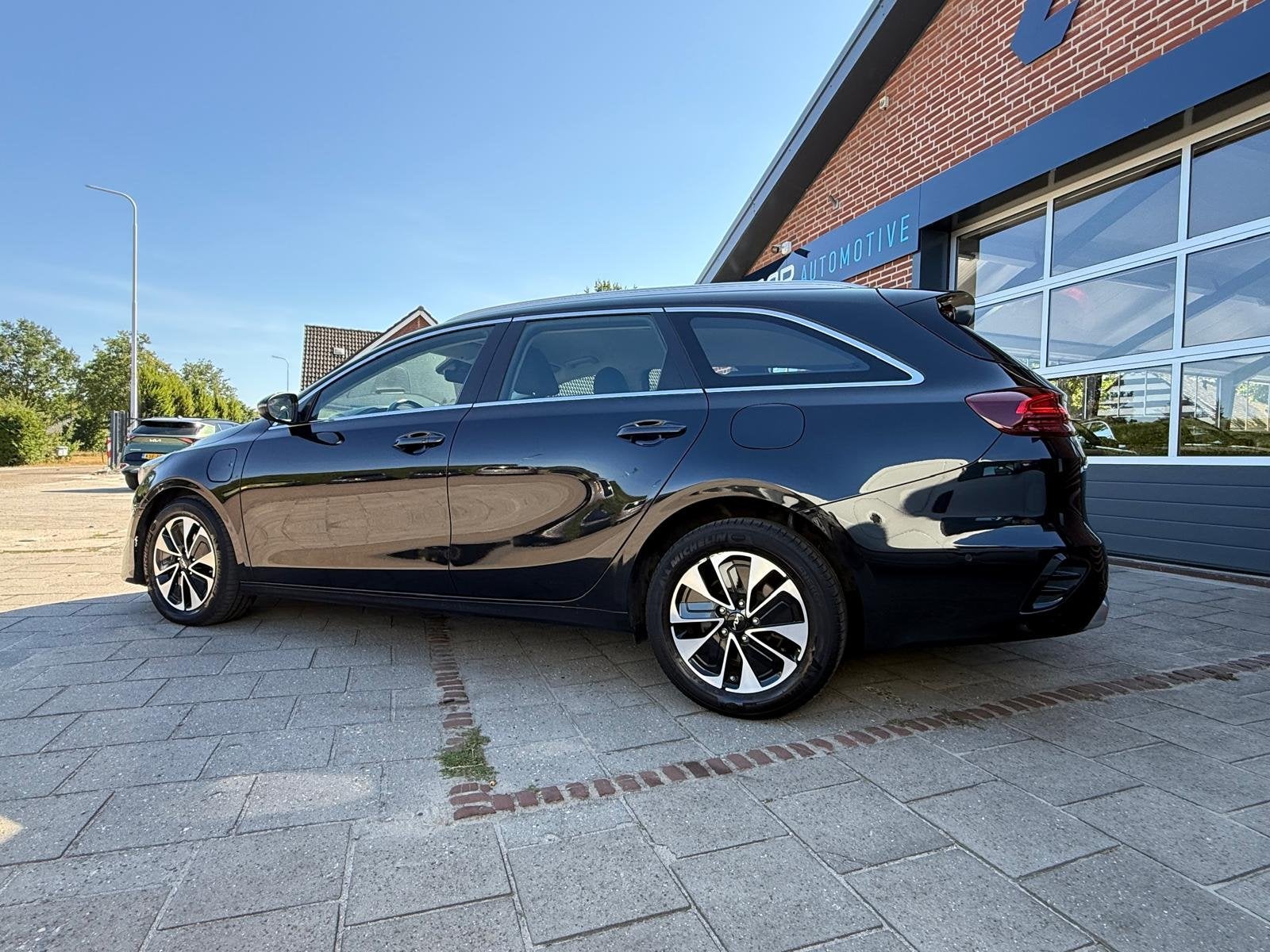 Kia Ceed Sportswagon 1.6 GDi 141PK PHEV DynamicPlusLine 1ste, Auto's, Dealer onderhouden, Gebruikt, Zwart, Zwart