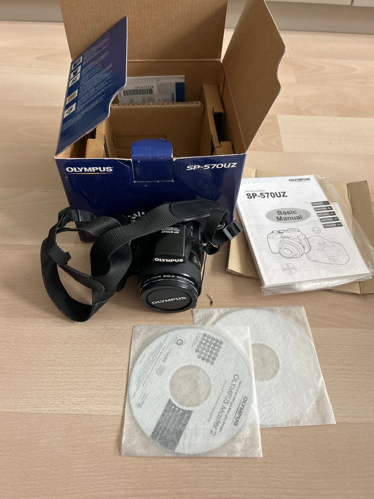 Olympus SP-570UZ Bridgecamera - Compleet met doos, Ingebouwde flitser, Handleiding, Ophalen of Verzenden, Zo goed als nieuw