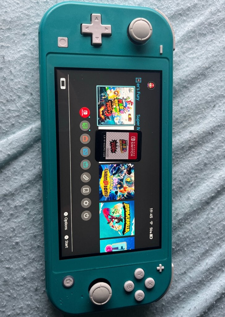 Switch lite met 128 sd kaart en super mario 3d world, Spelcomputers en Games, Ophalen of Verzenden, Zo goed als nieuw