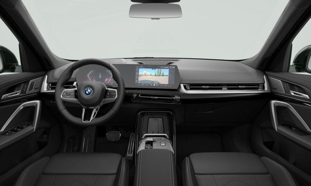 BMW iX1 eDrive20 67 kWh | SoH 100% | M-Sport Pro | Adaptive, Auto's, BMW, 514 km, Met garantie (alle), Zwart, 204 pk