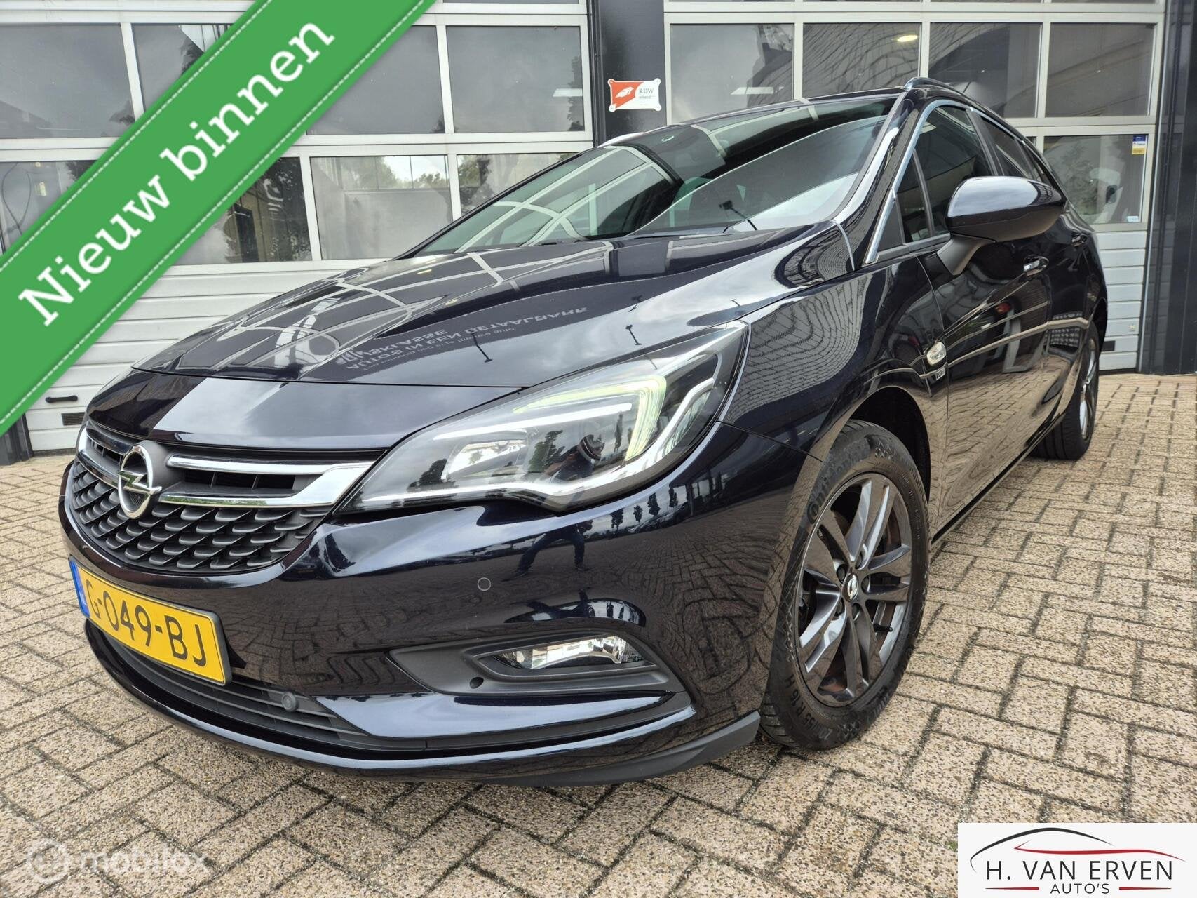 Opel Astra Sports Tourer 1.4 Turbo 120 Jaar Edition, Auto's, Voorwielaandrijving, 4 cilinders, 150 pk, Blauw