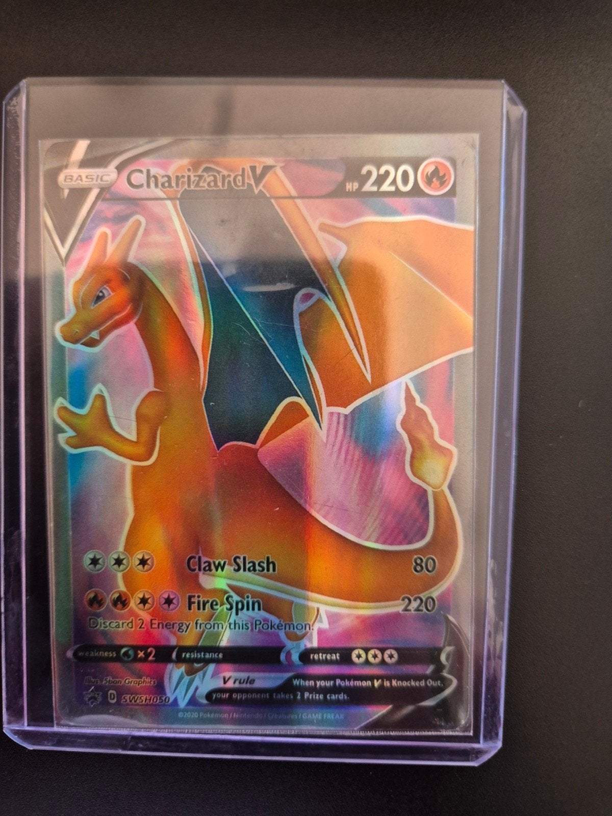 Charizard V (SWSH050) Pokemonkaart. Goed lezen!!, Hobby en Vrije tijd, Ophalen of Verzenden, Gebruikt, Losse kaart