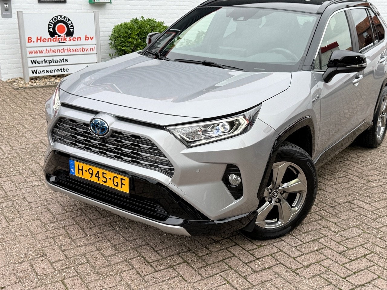 Toyota RAV4 2.5 Hybrid 218pk CVT Bi-Tone/ Alarm klasse 3/ Af, Gebruikt, 4 cilinders, 2487 cc, Leder en Stof
