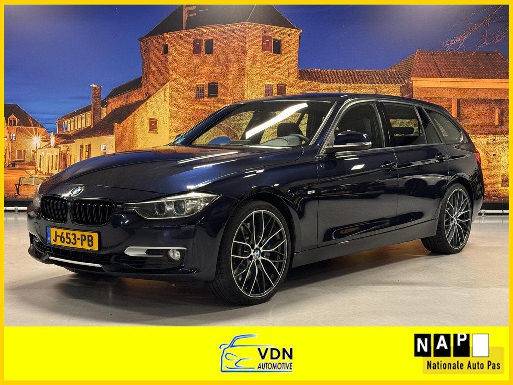 BMW 3-serie Touring 335i xDrive High Exe Aut Leer Camera Xen, Auto's, Automatische klimaatregeling, Blauw, Leder, Vierwielaandrijving