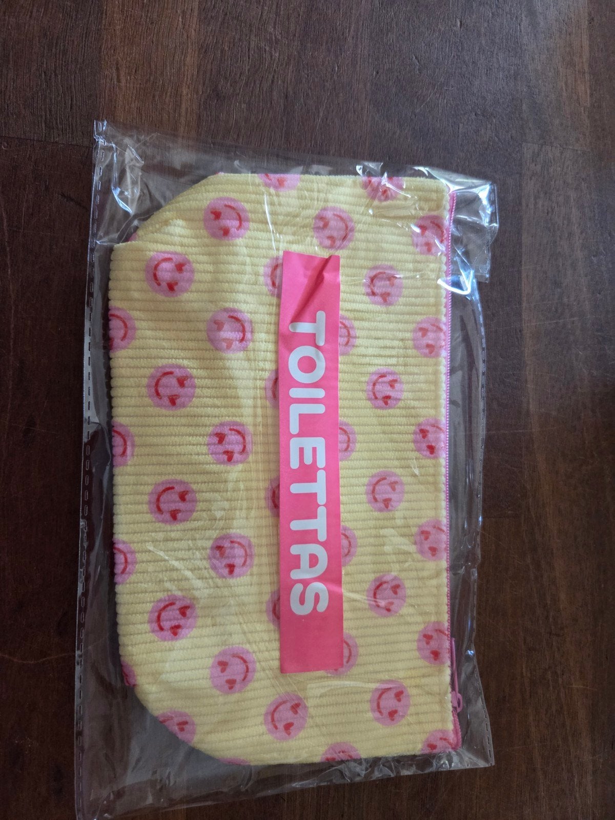 Nieuwe toilettas met vrolijke smiley print, Ophalen
