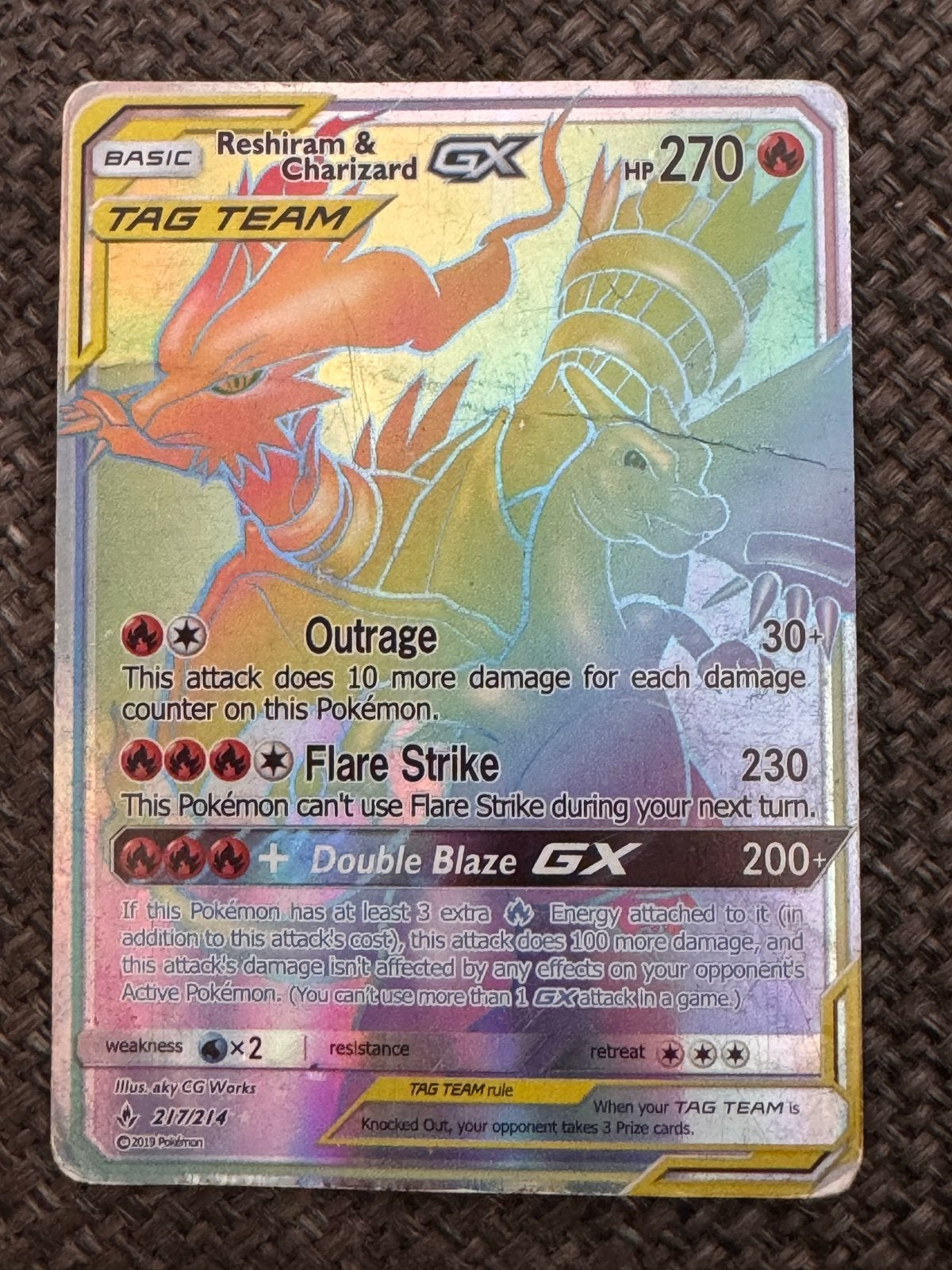 Pokémon Reshiram & Charizard GX TAG TEAM (met deuk), Hobby en Vrije tijd, Ophalen of Verzenden, Gebruikt, Losse kaart, Foil