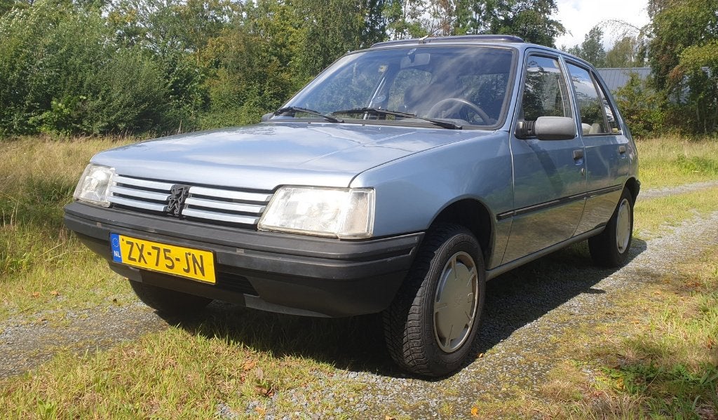 Peugeot 205 1.1 GL Hawaii 1991 5-deurs benzine - 2 jaar APK, Voorwielaandrijving, Stof, 4 cilinders, Blauw