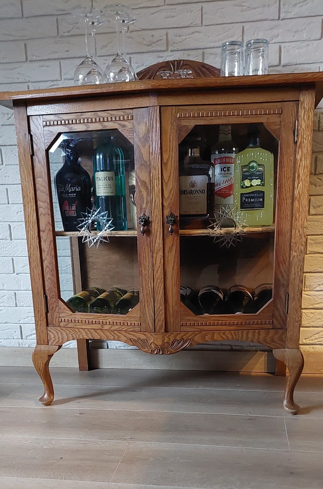 Drankenkast met geslepen glas, Ophalen
