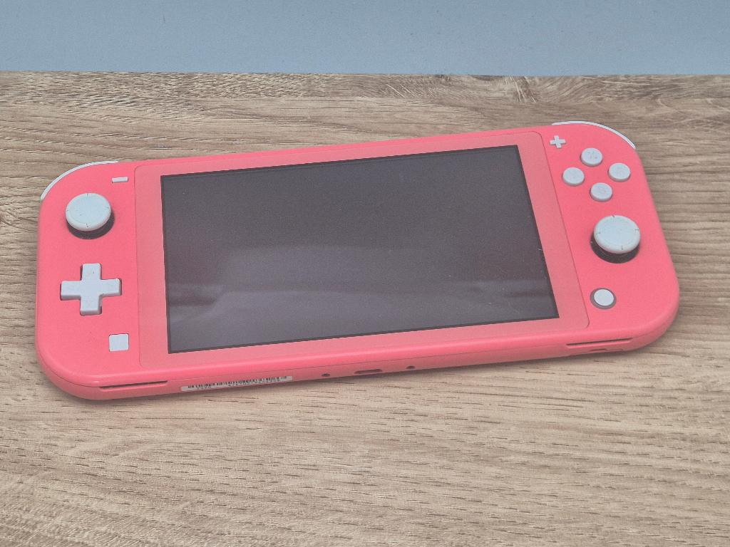 Zeer nette Nintendo Switch Lite Roze (Coral Pink), Nintendo, Nintendo, Nintendo, Ophalen of Verzenden