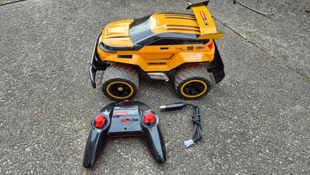 Carrera RC radiografische auto met LiPo accu en USB lader, Elektro, Ophalen of Verzenden, Zo goed als nieuw, Auto onroad
