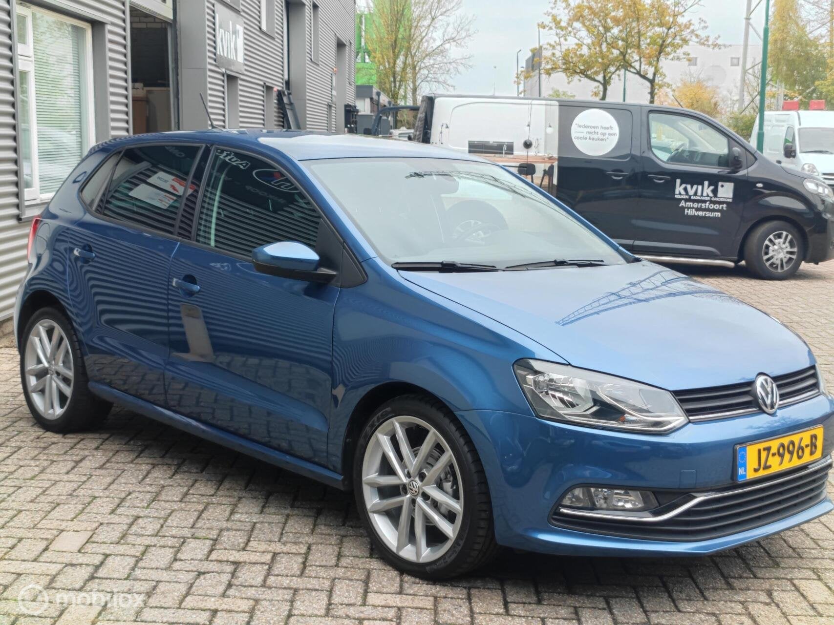 Volkswagen Polo 5-deurs 1.2TSi Highline Executive Clima Navi, Auto's, 40 €/maand, Euro 6, 4 cilinders, Blauw