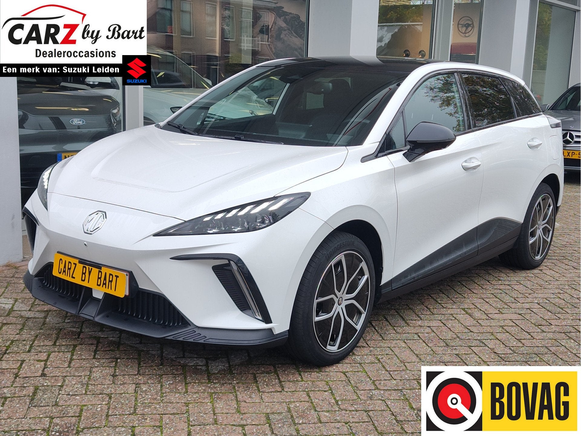 MG Mg4 electric TROPHY EXTENDED RANGE 77 kWh 360 Camera | Wa, Auto's, Automaat, Achterwielaandrijving, Zwart, Leder en Stof