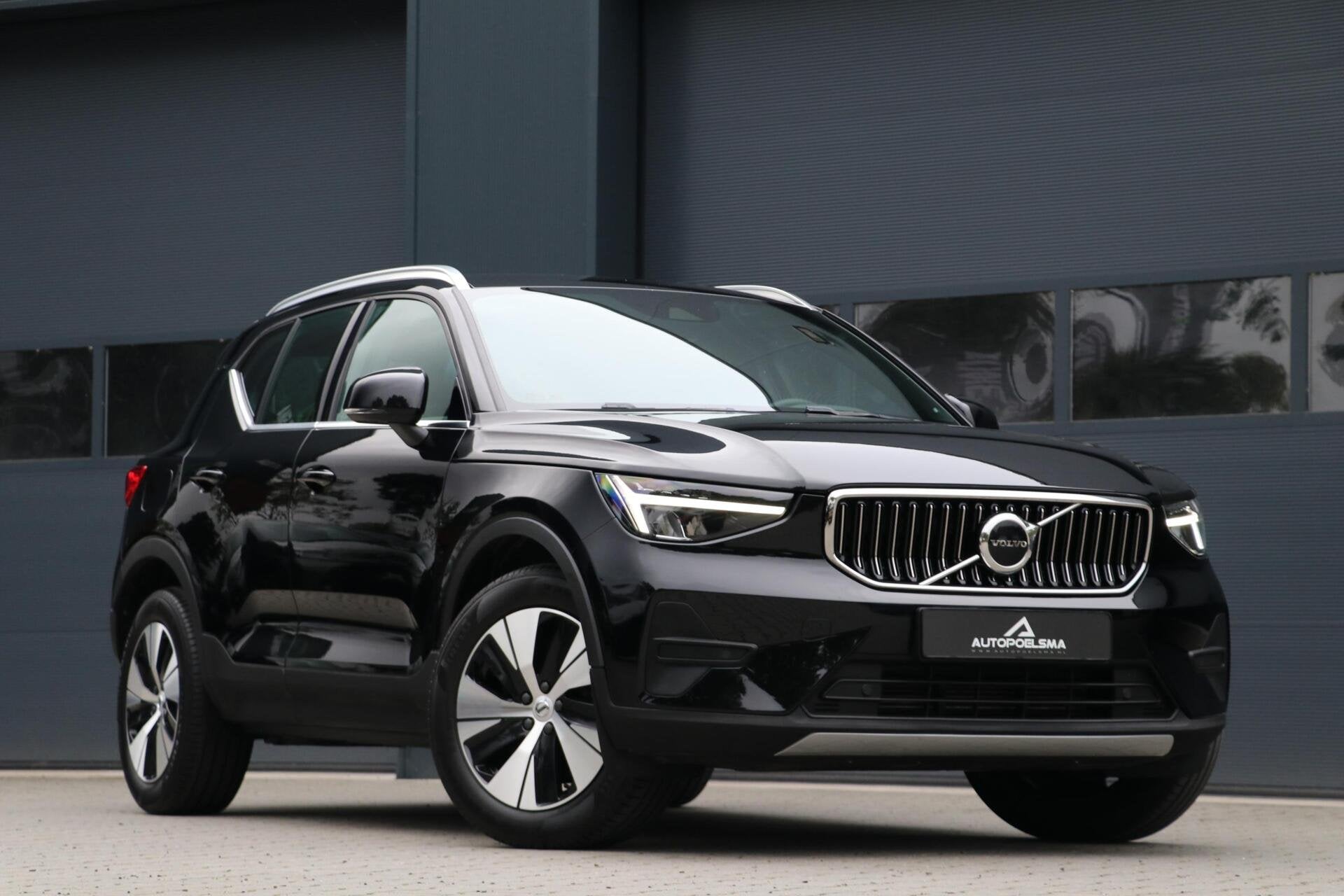 Volvo XC40 1.5 T4 Plug-in hybrid Core Bright AppleCarplay Sp, Stof, Zwart, Plug-in hybride, Bedrijf