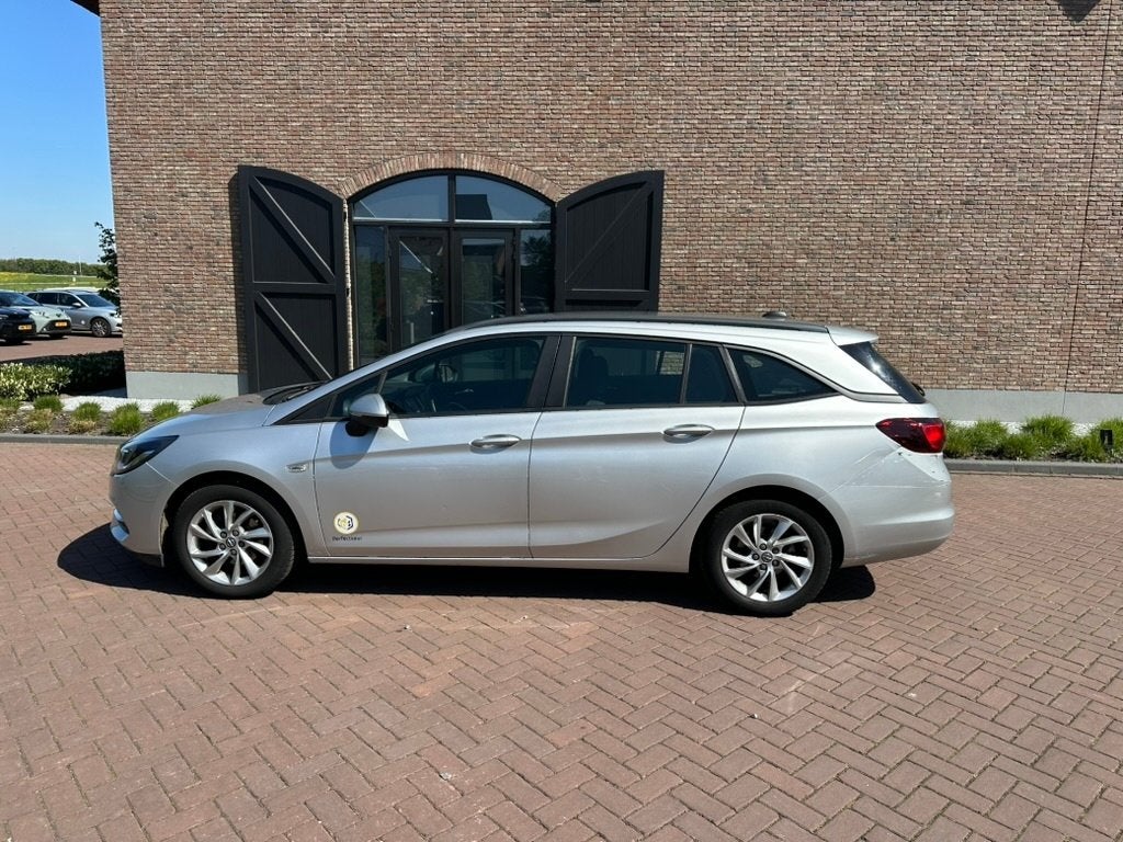 Opel Astra 1.2 Turbo 130pk Start/stop 2019 Grijs, Voorwielaandrijving, Dealer onderhouden, Stof, 1250 kg