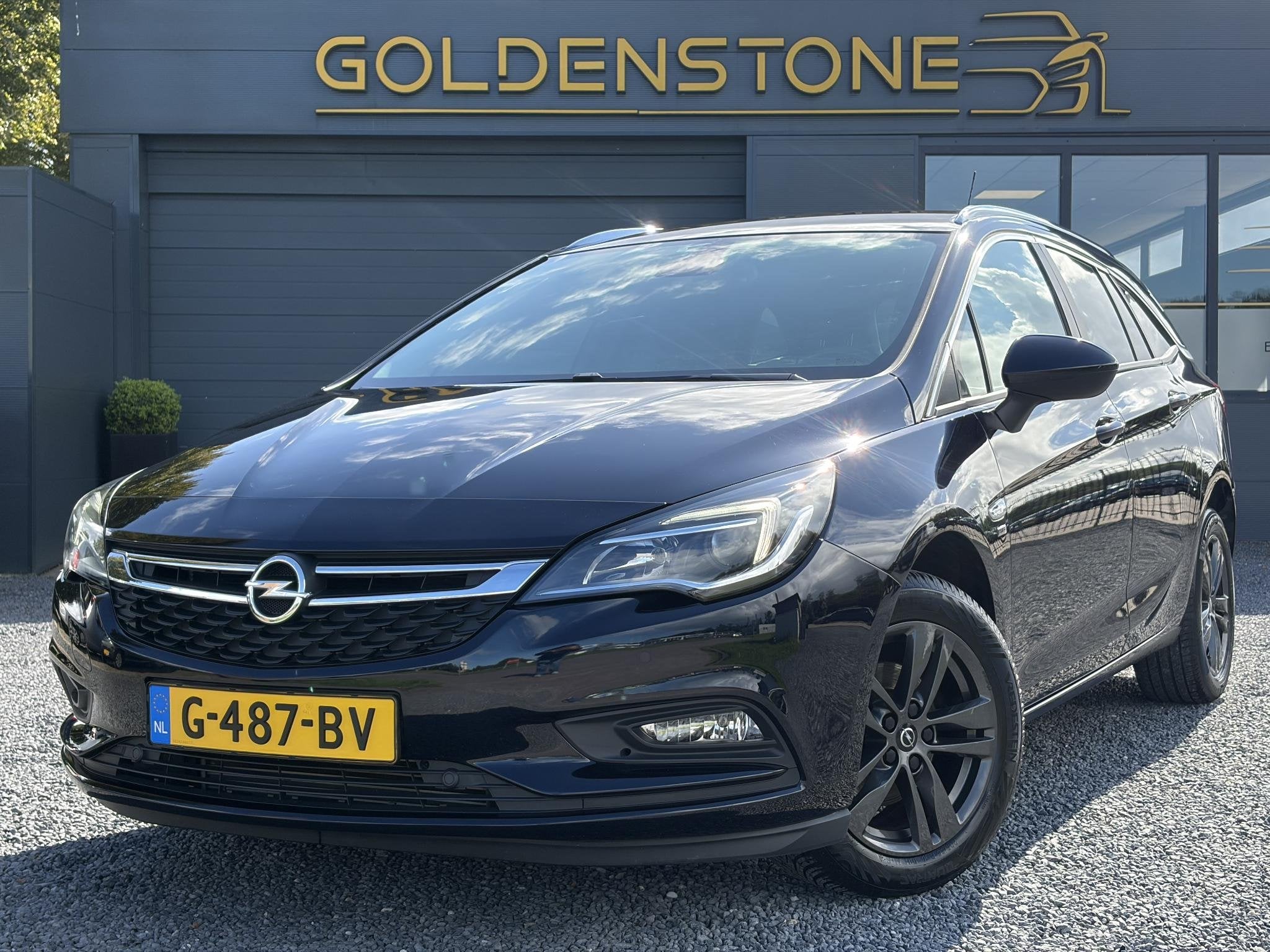 Opel Astra Sports Tourer 1.4 Turbo 120 Jaar Edition ✓150pk, Auto's, Voorwielaandrijving, Dealer onderhouden, Stof, Gebruikt