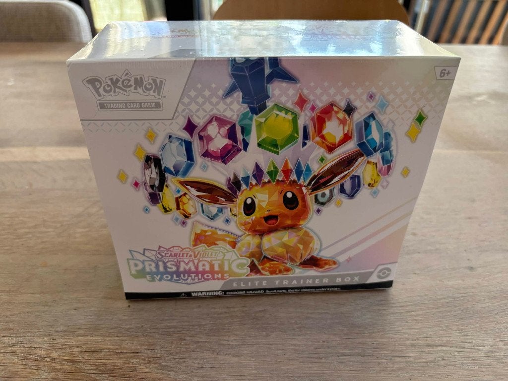 Pokemon TCG - Prismatic Evolutions Elite Trainer Box ETB, Ophalen of Verzenden, Nieuw, Starterdeck