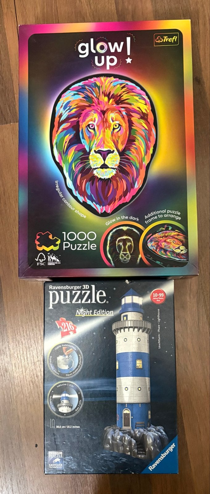 Twee Puzzels: Trefl Glow Up Leeuw & Ravensburger 3D Vuurtore, Ophalen of Verzenden, 500 t/m 1500 stukjes, Zo goed als nieuw, Legpuzzel