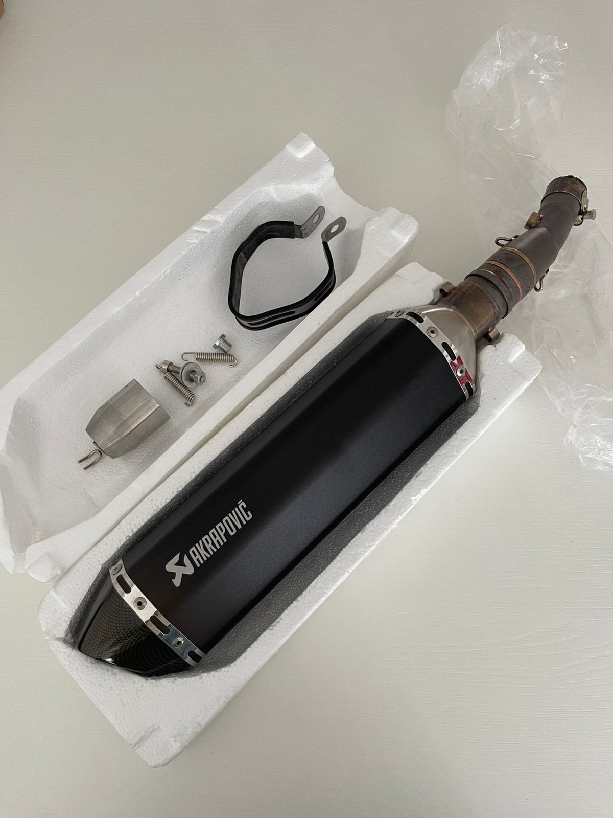 Akrapovic replica (linkpipe X-Max 300), Ophalen