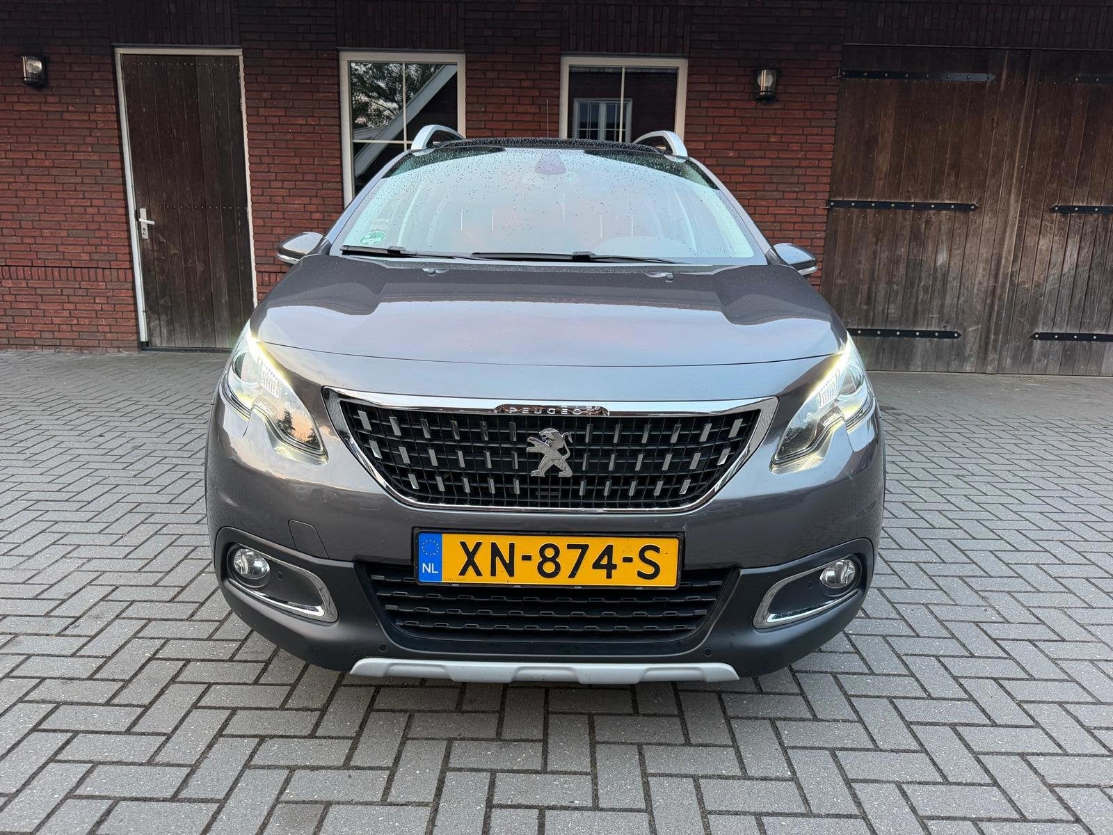 Peugeot 2008 1.2 PureTech Allure| Pano| Trekhaak| D-Riem ver, Auto's, Peugeot, Stof, 1199 cc, 1165 kg, Bedrijf