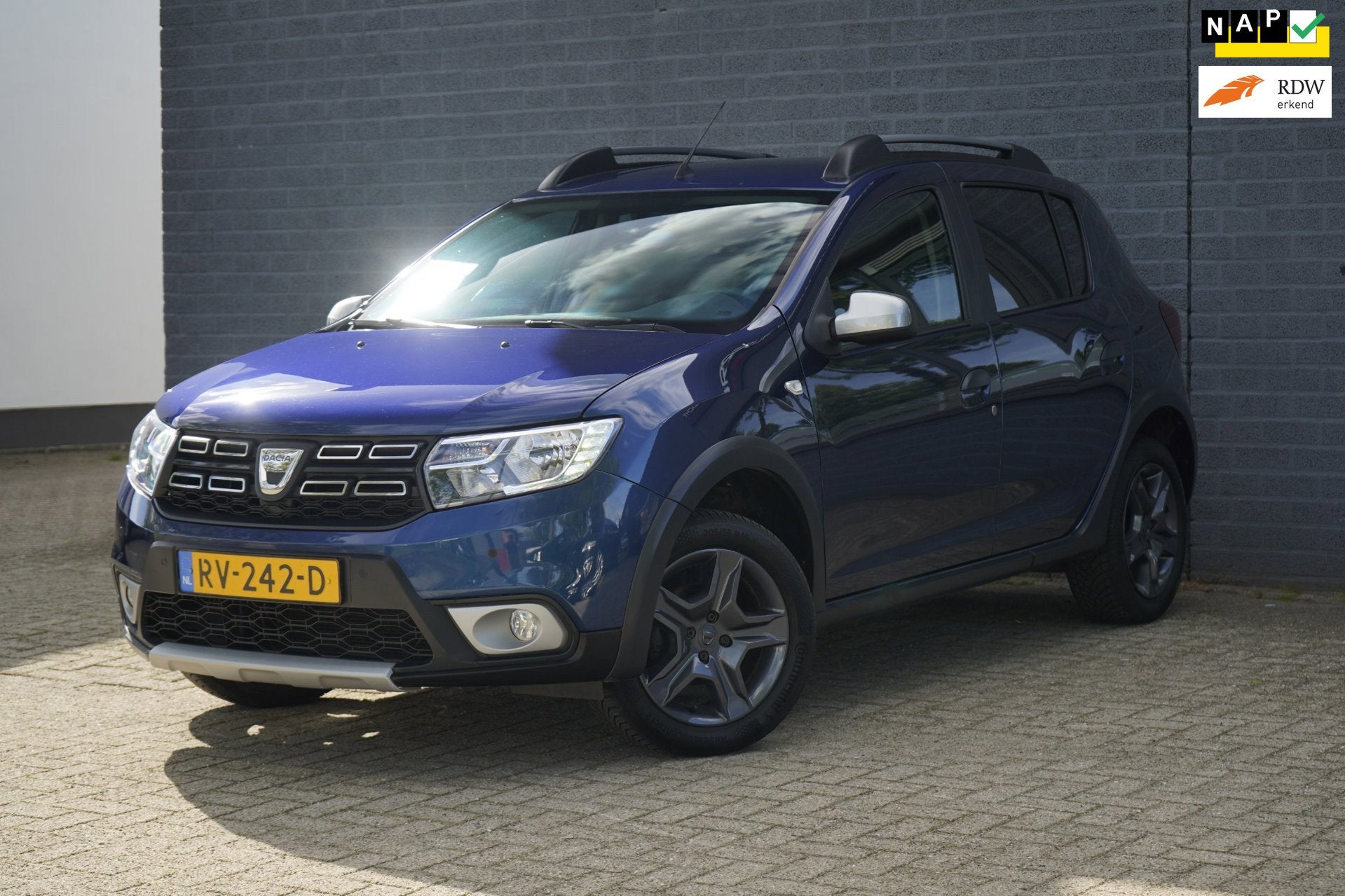 Dacia Sandero 0.9 TCe SL Stepway Automaat, Trekhaak, Airco, Auto's, 898 cc, Stof, Blauw, Origineel Nederlands