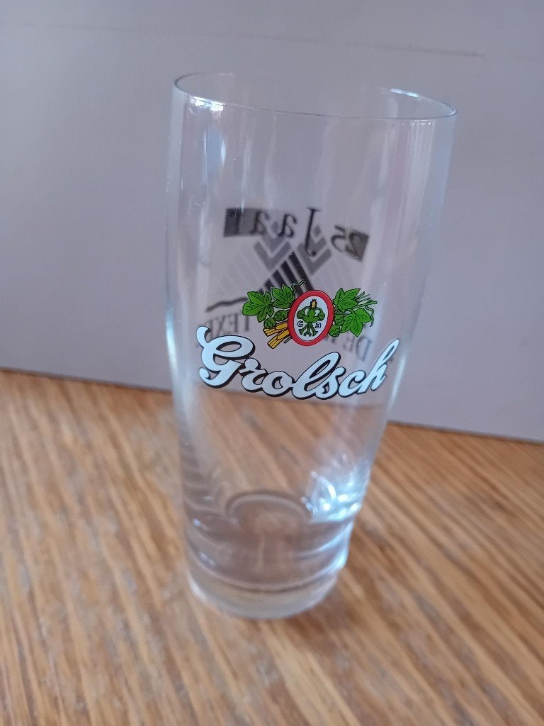 Grolsch bierglas 13cm dubbeldruk 25-jaar De Krim Texel, Ophalen of Verzenden, Zo goed als nieuw, Glas of Glazen, Grolsch