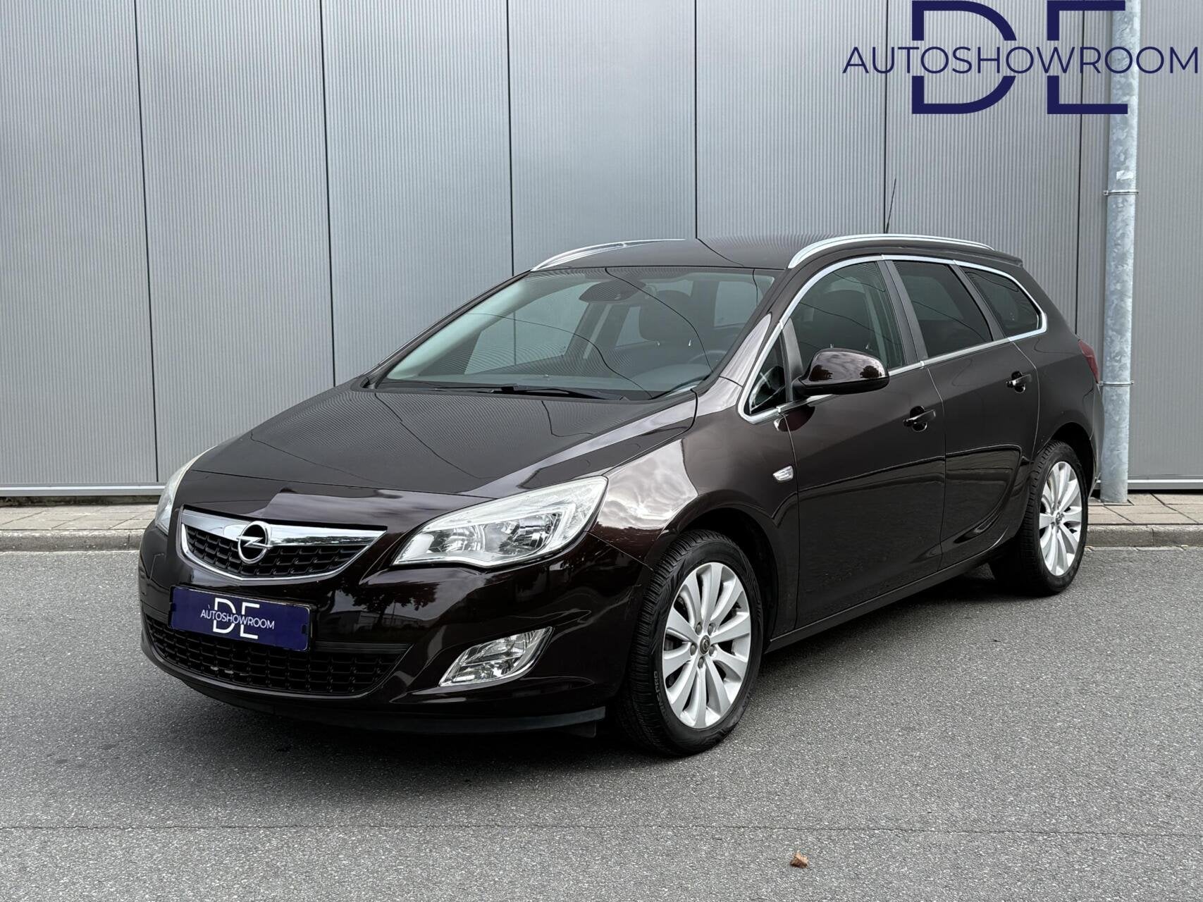 Opel Astra Sports Tourer 1.4 Turbo Cosmo | Trekhaak | Clima, Auto's, Voorwielaandrijving, Euro 5, Huisgarantie, 4 cilinders