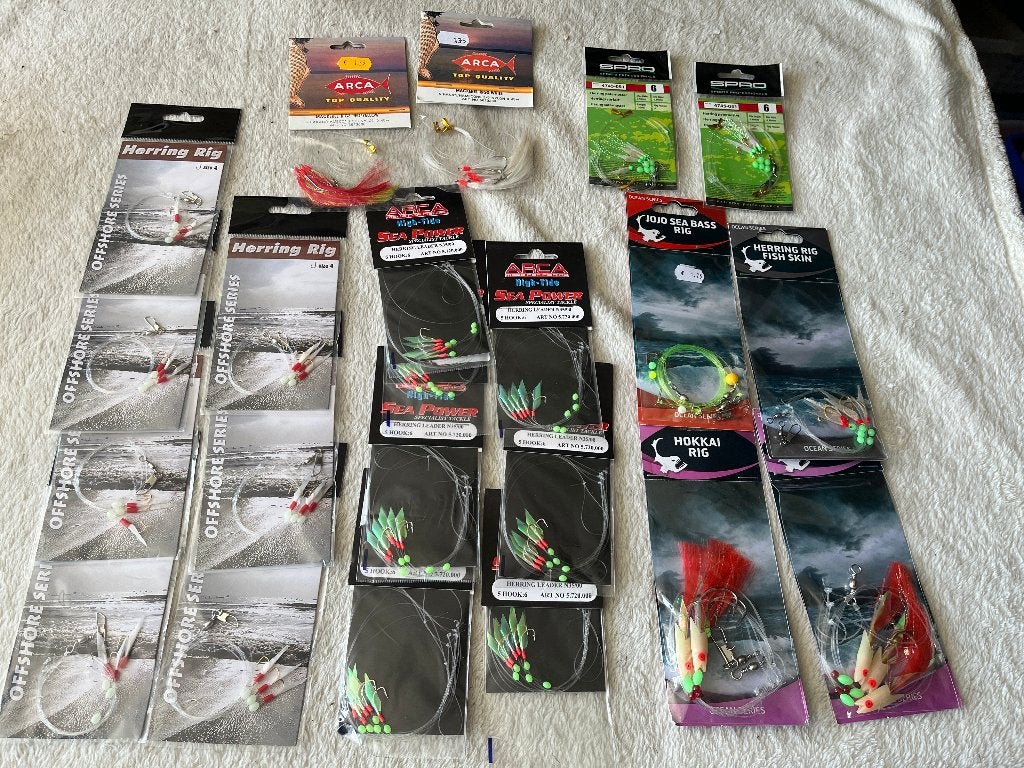 adv 69 / NIEUW mixset 24 pakjes diverse zeevis onderlijnen, Ophalen of Verzenden, Nieuw, Haak