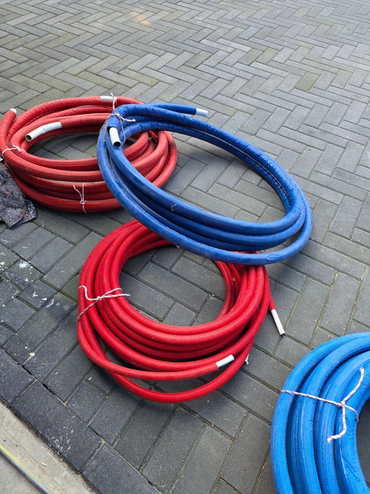 Partij geïsoleerde meerlagenbuis / alu-pex (Henco) Rood &bl, Ophalen, Pvc, 6 meter of meer, Nieuw