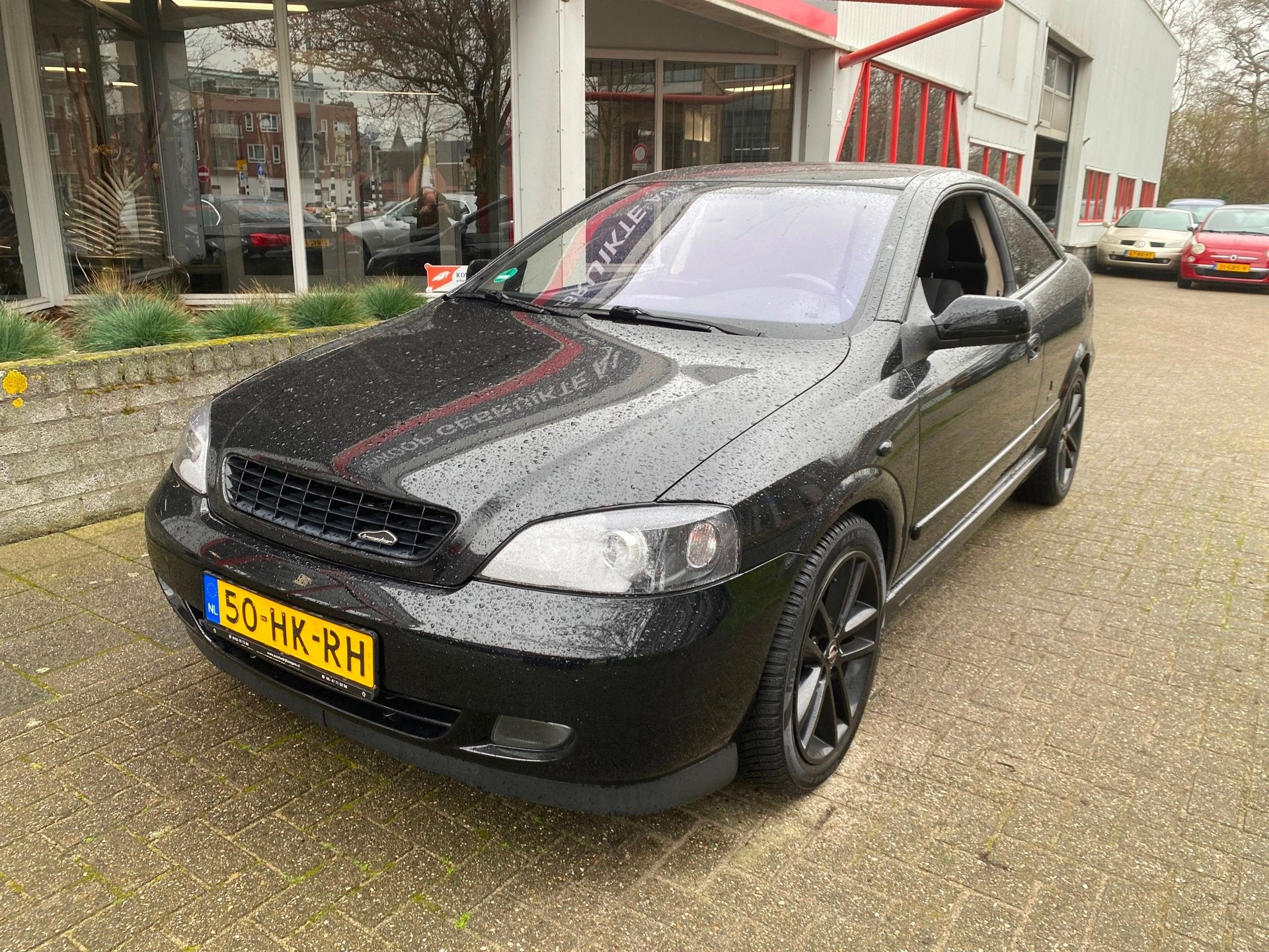 Opel Astra Coupé 2.2-16V - Full Black Edition - Inruil Mog, Auto's, Voorwielaandrijving, Metallic lak, Gebruikt, 4 stoelen