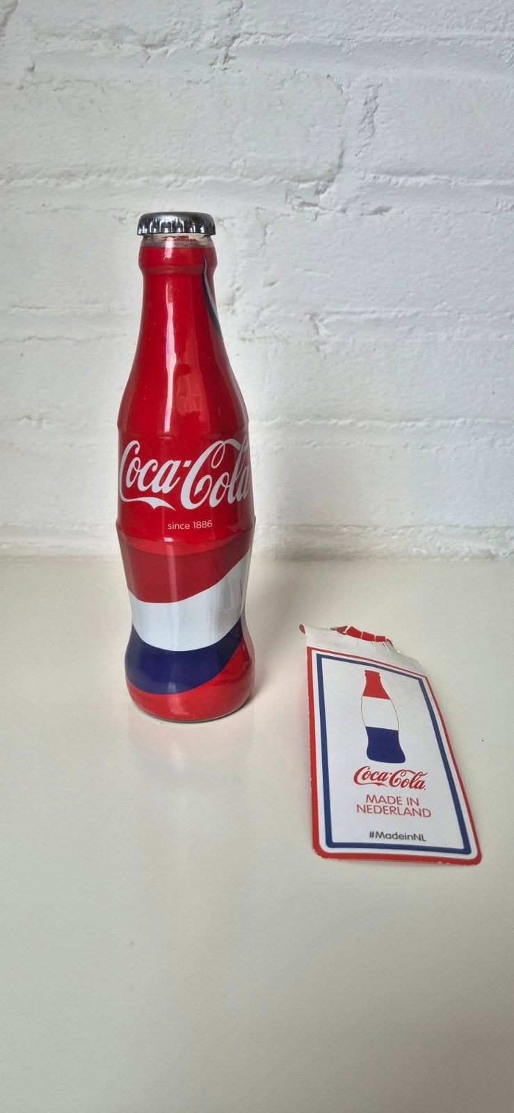 Coca-Cola collectibles / wrapped Bottle, Verzamelen, Ophalen of Verzenden, Zo goed als nieuw, Verpakking