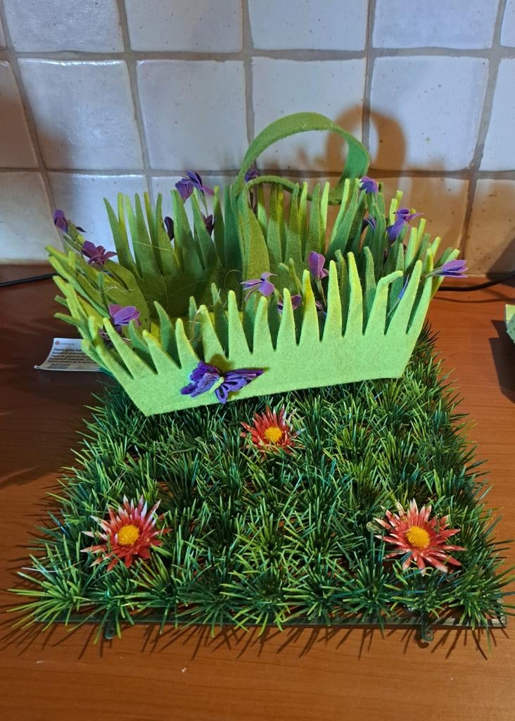 Grasveld en paasmandje, Ophalen