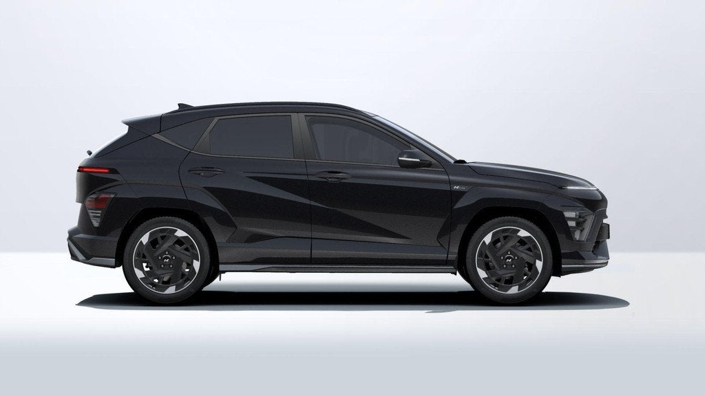 Hyundai Kona Electric N Line Business 64.8 kWh | DIRECT UIT, Auto's, Hyundai, 12 maanden, Stof, 750 kg, Zwart