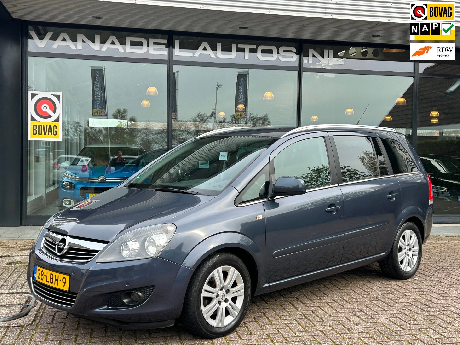 Opel Zafira 1.8 Cosmo Aut. 7-Pers! Navi Cruise Park.Sens Tre, Auto's, Gebruikt, Zwart, 4 cilinders, Blauw