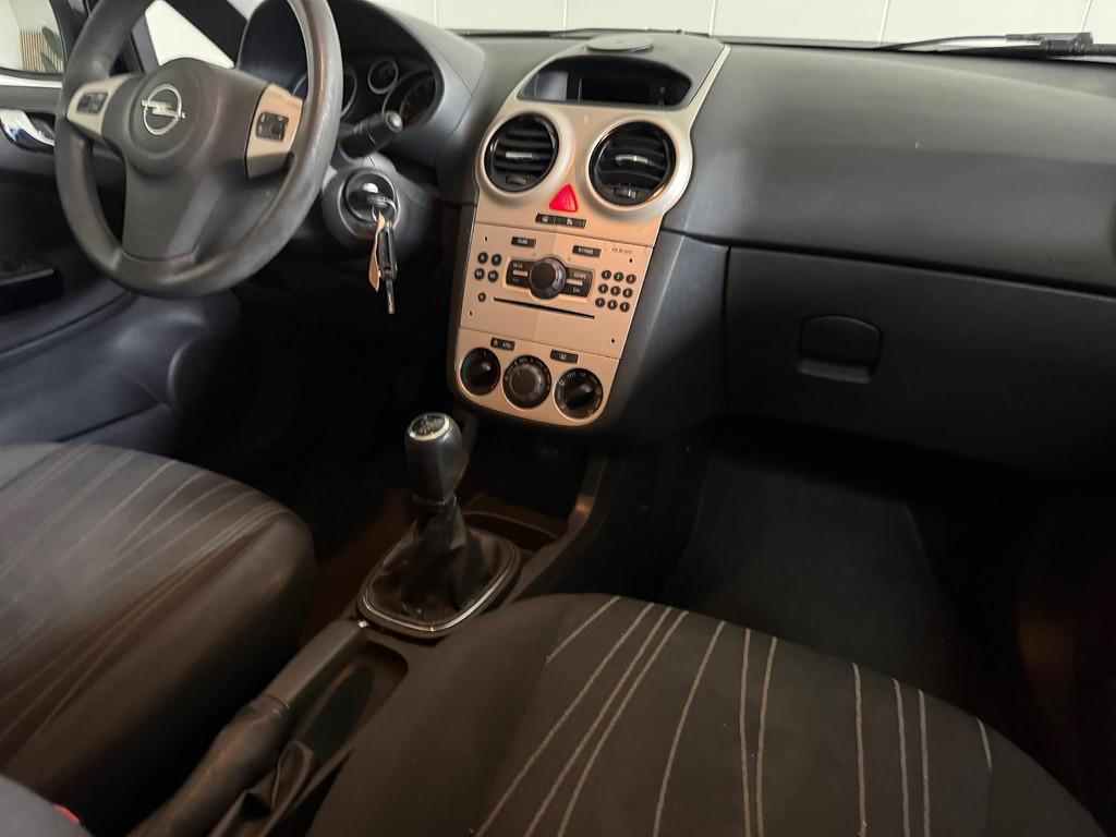 Opel Corsa 1.2-16V Enjoy Airco, LMV, Auto's, Voorwielaandrijving, Gebruikt, 4 cilinders, Blauw