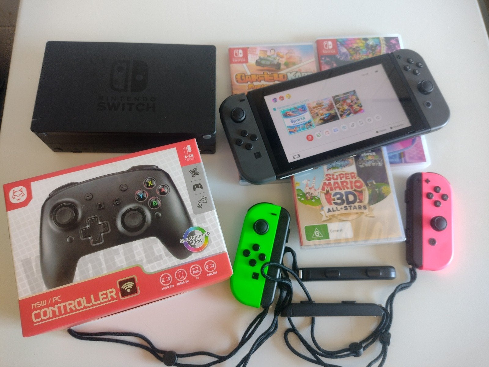 Nintendo Switch met 3 games, 4 Joy-Cons en 1 controller, Spelcomputers en Games, Spelcomputers | Nintendo Switch, Ophalen of Verzenden