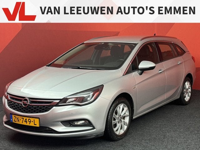 Opel Astra Sports Tourer 1.4 Turbo Business Executive, Auto's, Opel, Gebruikt, 150 pk, Leder en Stof, Origineel Nederlands
