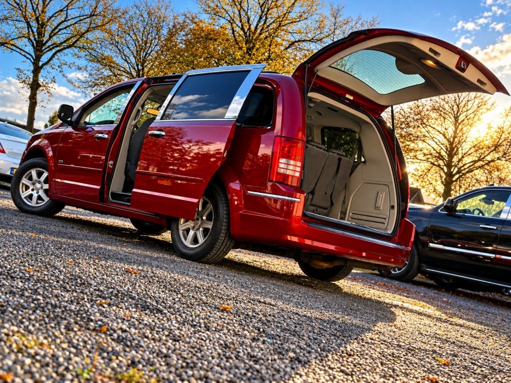 CHRYSLER GRAND VOYAGER 3.8 V6 LIMITED MAGMA-RED SWIVEL&GO.TA, Auto's, Dealer onderhouden, Stof, Gebruikt, Zwart